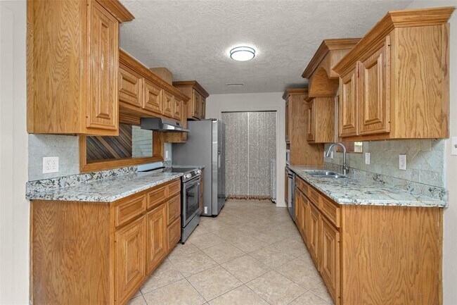 Building Photo - 9810 Kiwi Ln