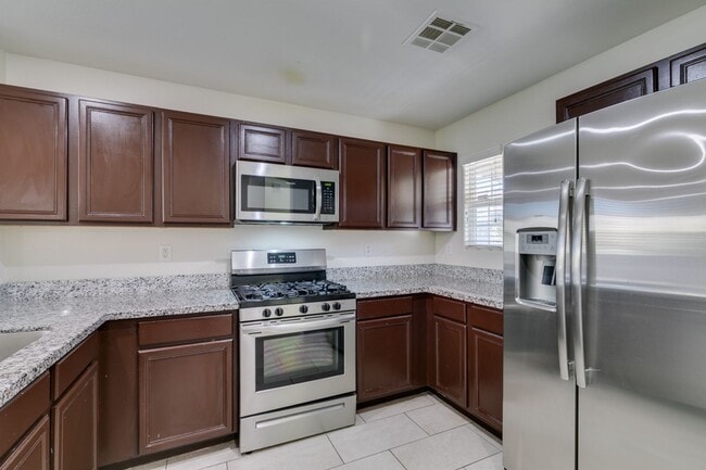 Building Photo - SOUTH WEST 3 BEDROOM UPDATED HOME WITH BALCONY