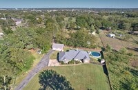 Building Photo - Private on 1.2 acres 3/2.5 bath w/2 car garage/20x30shop &pool