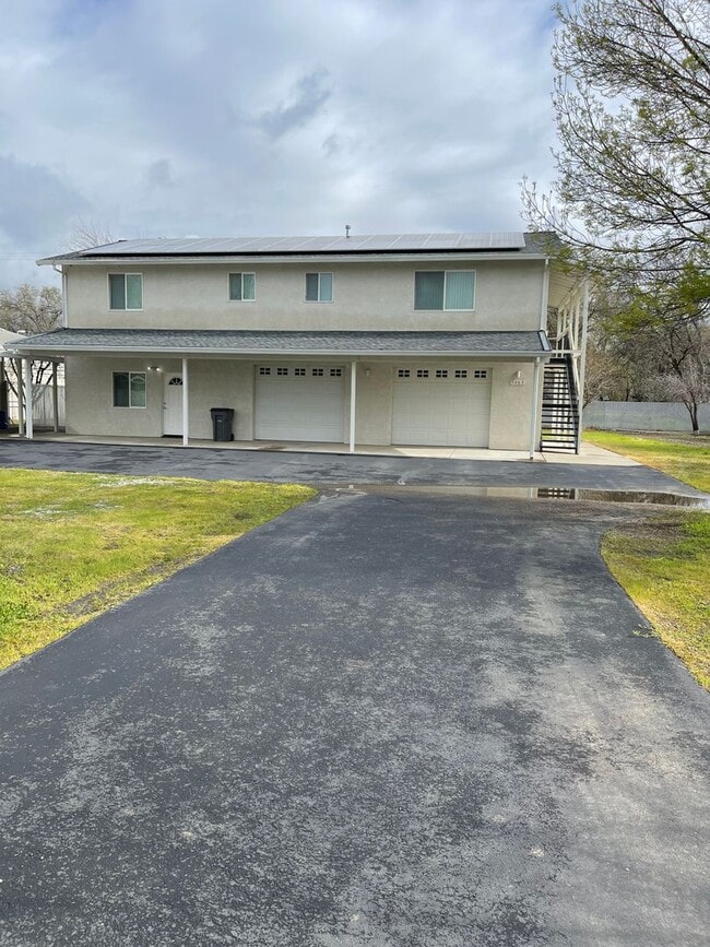 Building Photo - 3 BED 2 BATH W/ATTACHED MOTHER-IN-LAW SUITE *SOLAR PANELS ON ROOF = LOW ELECTRIC BILL*