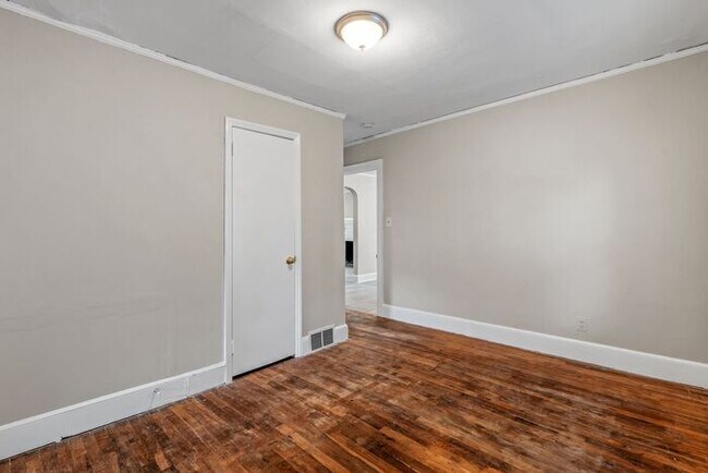 Building Photo - Adorable Home, Just Painted, Wood Flooring...