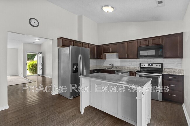 Building Photo - 3409 Woodbaugh Dr