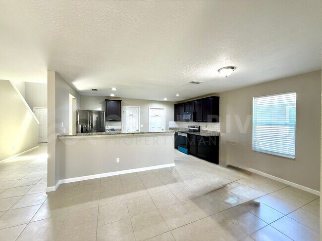 Building Photo - Room to Live, Space to Thrive! Stunning 6BR Home with Solar, Upgrades & Screened Lanai in Macclen...