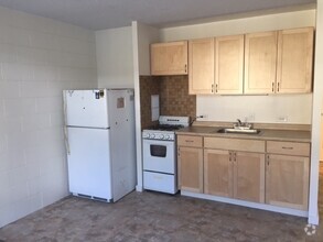 Building Photo - $1,450 Low rise Studio with all utilities ...