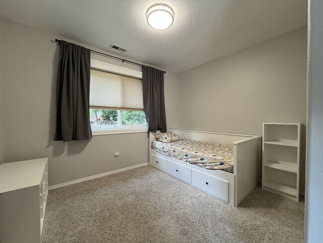 Building Photo - Spacious 3-Bedroom Home with Two Living Areas, Private Balcony, Fireplace & Attached 2-Car Garage