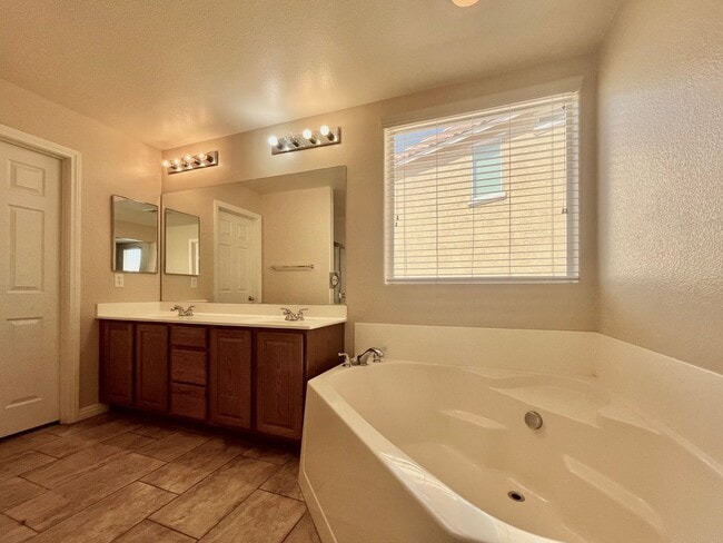 Building Photo - **COMING SOON**Spacious 4-Bedroom Home with Oversized Loft & Expansive Backyard