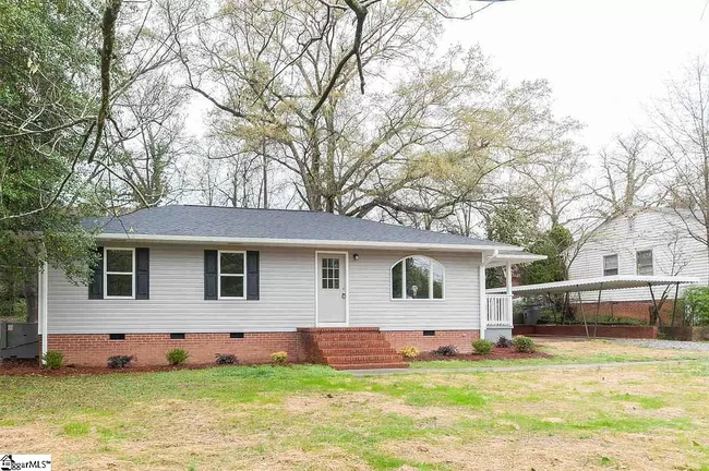 Covered side porch and single car port. Driveway fits 3+ cars. - 1 Bent Twig Dr