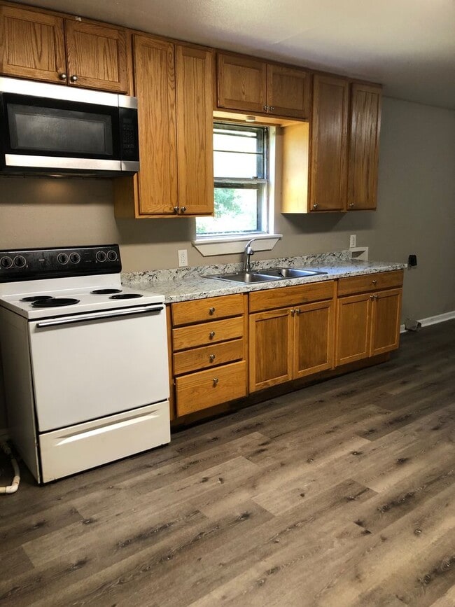 Building Photo - Nicely updated home with large kitchen and...