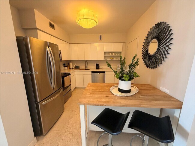 Building Photo - 5700 Collins Ave