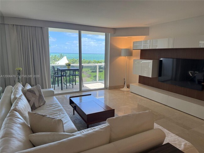 Building Photo - 10275 Collins Ave