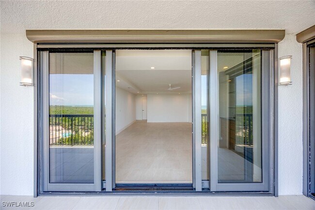 Building Photo - 6075 Pelican Bay Blvd