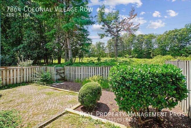 Building Photo - 7864 Colonial Village Row