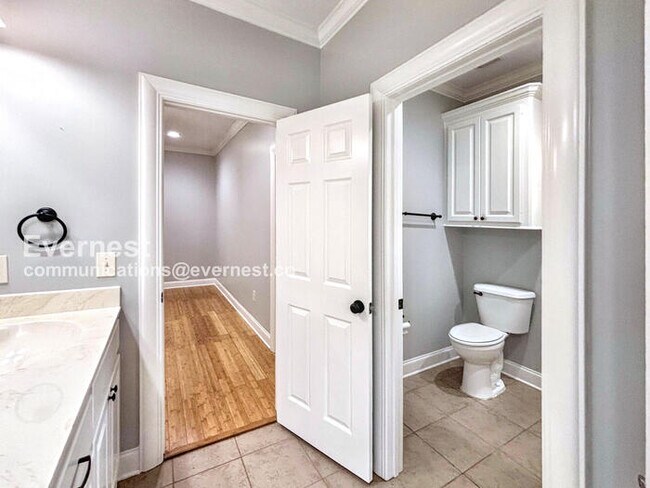 Building Photo - 4-Bedroom Home with Garage / Available Now!