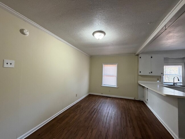 Building Photo - Great Experiences Are Just Around The Corner. Charming 2 bedroom Ranch Style Bungalow.