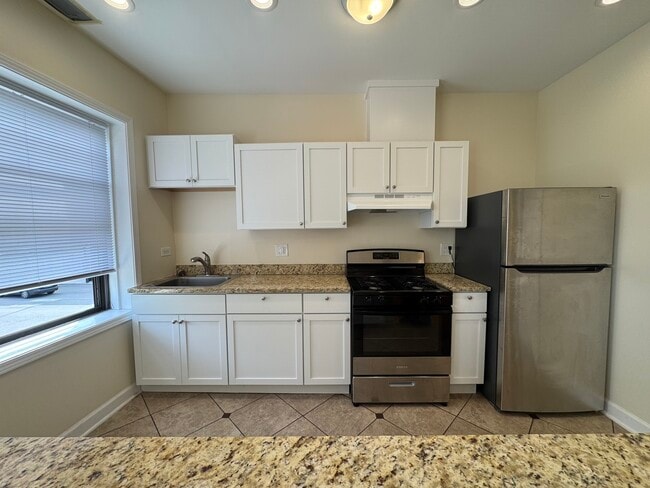 Building Photo - 1746 W Estes Ave