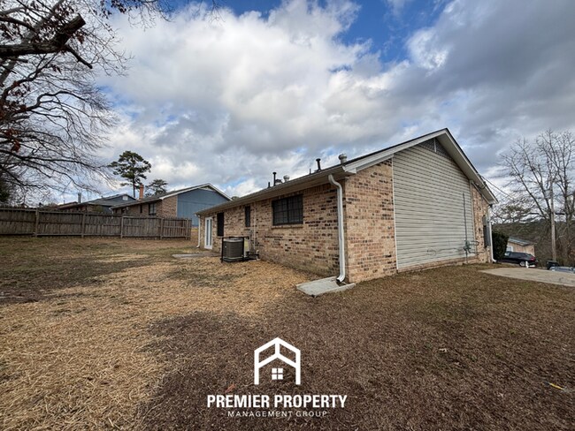 Building Photo - Charming 3BR Birmingham Home w/ Hardwood Floors, Brick Fireplace & Spacious Backyard