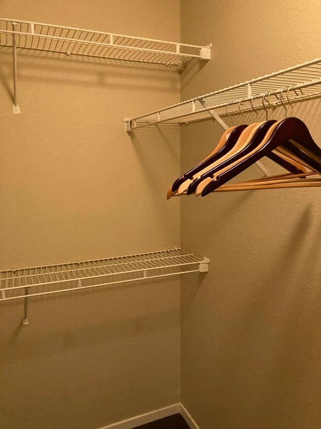 Building Photo - Gated community just minutes south of the strip, 2br/2bath, 2nd floor condo.