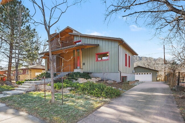 Building Photo - "Modern 4-Bed Boulder Retreat with Granite Elegance & Finished Basement!"