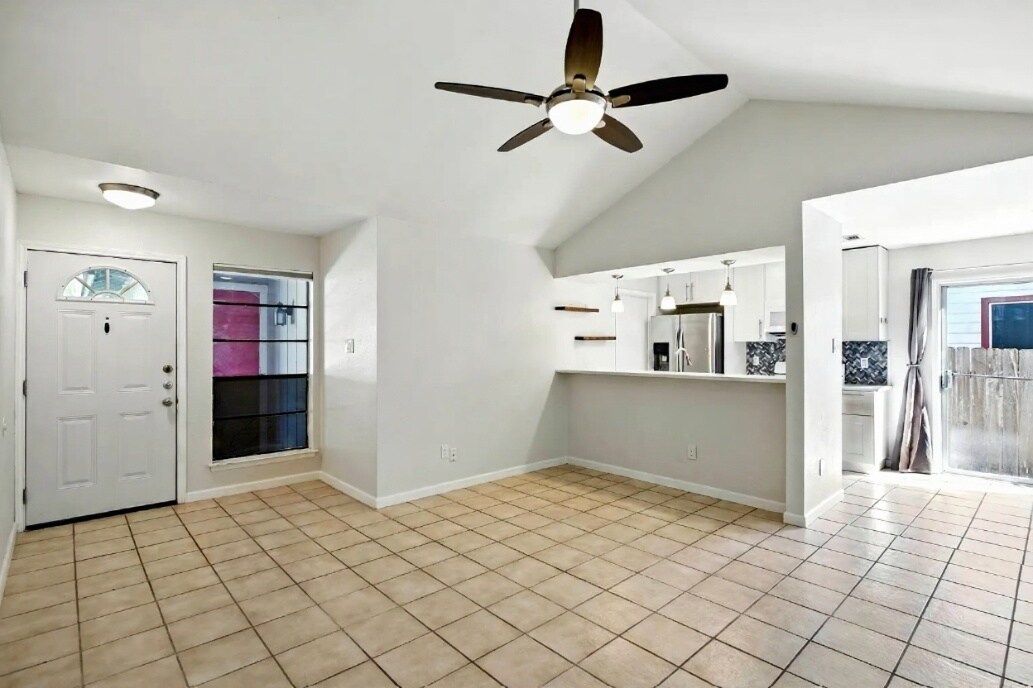 Living area and kitchen bar - 11401 Ptarmigan Dr