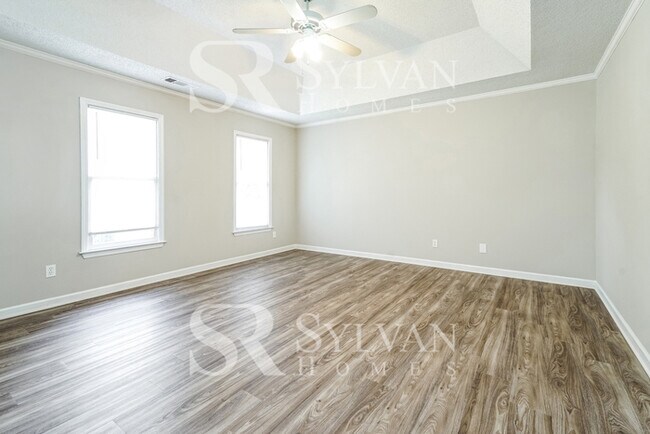 Building Photo - The living is easy in this 4 bedroom, 2.5 ...