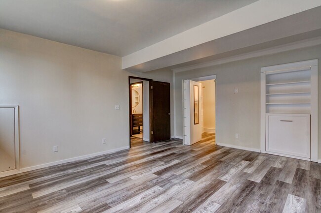 Building Photo - Spacious 4-Bedroom Home with Modern Upgrad...