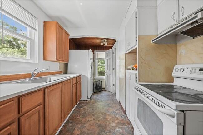 Building Photo - Bright living ? cozy dining flow for every...