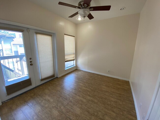 Building Photo - UT PRE-LEASE: 2 BR / 1 BA West Campus Condo - Walk to UT - Private Balcony - W/D