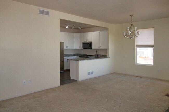 Building Photo - Updated 3bed/2.5bath/2car garage across fr...