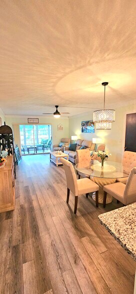 Spacious dining and living room space - 8740 Lueck Ln