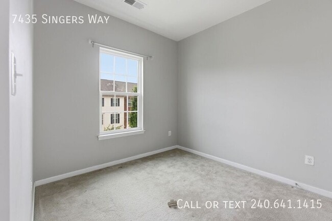 Building Photo - 7435 Singers Way