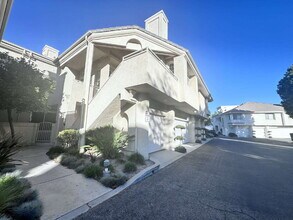 Building Photo - "Charming 2-Bed, 2-Bath Condo with Cozy Fireplace in Prime Stevenson Ranch Location!"