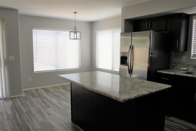 Building Photo - 12409 W San Juan Ave