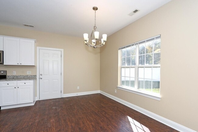 Building Photo - Welcome to this stunning 5 bedroom, 2.5 bath home nestled in the desirable location of Cornelius,...