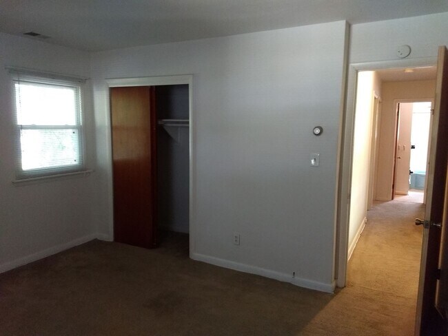 Building Photo - TRI-LEVEL HOME WITH GARAGE AND LARGE FENCE...