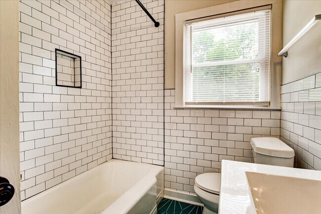 Building Photo - Welcome to this beautifully renovated cond...