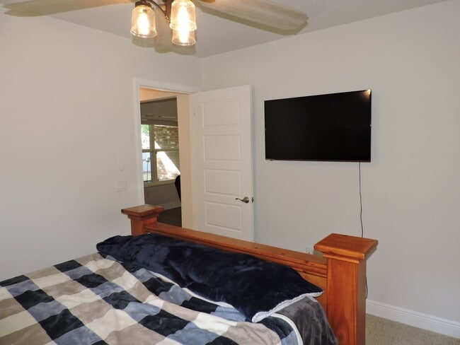 Building Photo - Almost new four bedroom home with solar pa...