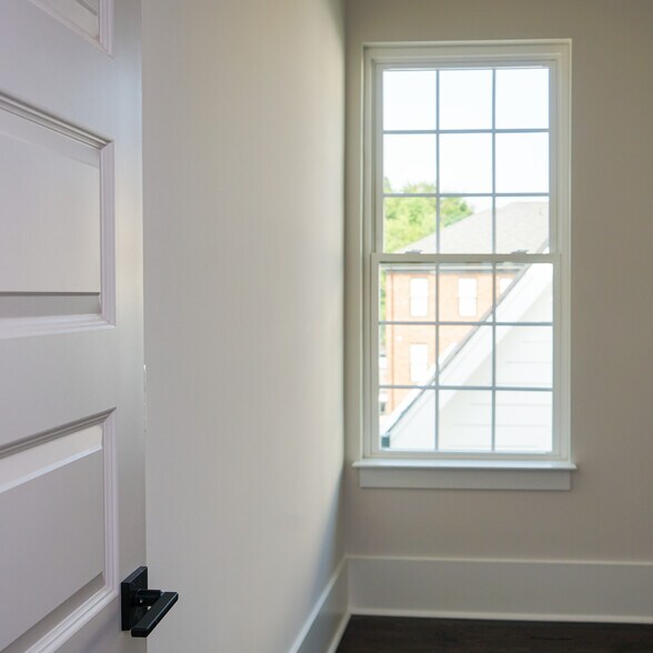 Second bedroom is spacious and has an en-suite full bath. - 1003 Parkwood Ave