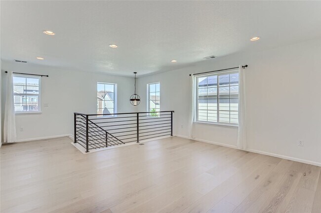 Building Photo - 3-Bedroom Home with Open Floor Plan, Private Balcony & Attached Garage