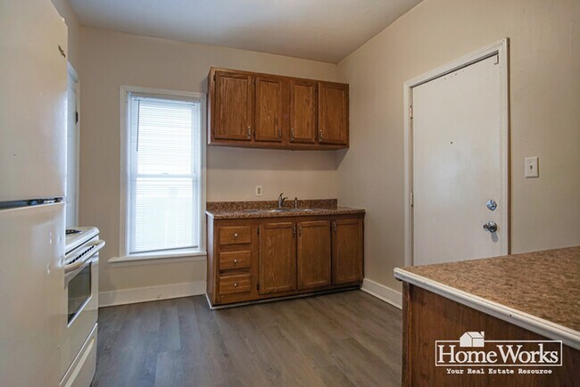 Building Photo - Charming 3 - Bedroom Home with Wrap-Around Porch on Corner Lot