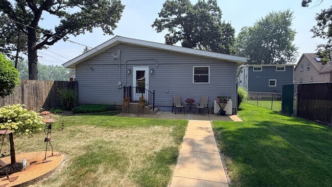 Building Photo - Riverfront Living on the Fox: 2 Bed, 1 Bath with Private Dock and Oversized Garage