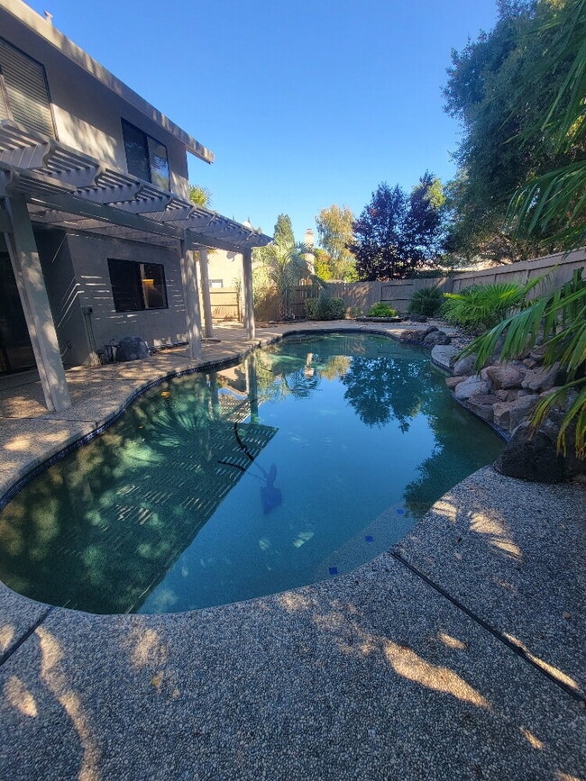 Building Photo - "Spacious 4-Bed, 3-Bath Oasis in Gold River with pool!"