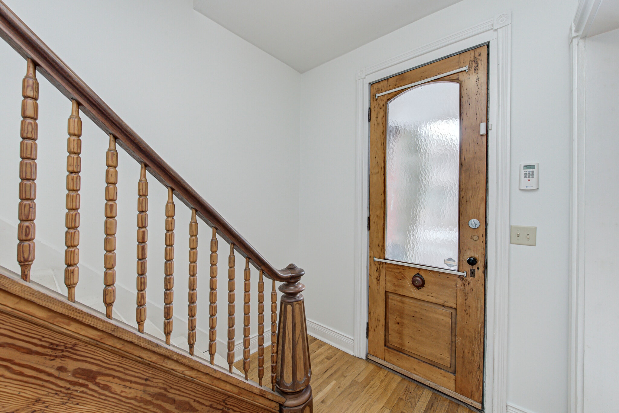 Staircase to second floor - 237 E Saint Joseph St