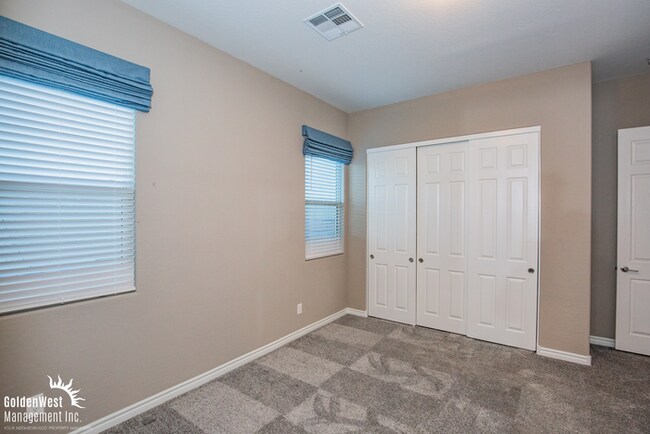 Building Photo - Welcome to this impressive single-story 4Bdm 3.5Ba residence located in a desirable Northwest Las...