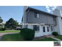 Building Photo - Located near Omaha and Powers, this fully ...