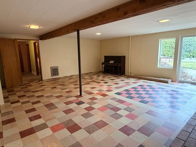 Building Photo - Country like setting! Spacious 3+ bed/ 1.5 bath house with garage, large yard, private deck and a...