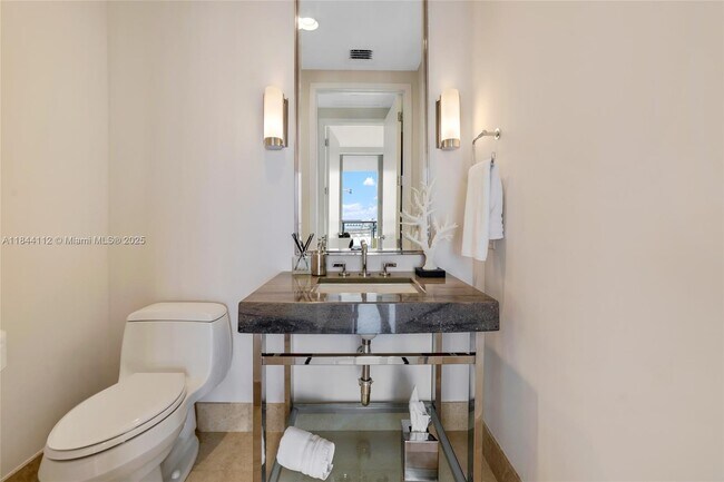 Building Photo - 9701 Collins Ave