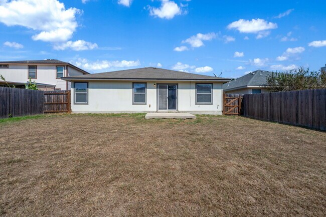 Building Photo - 4935 Dahlia Terrace