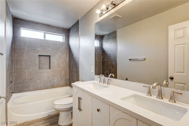 Building Photo - 9060 Candyland Ave