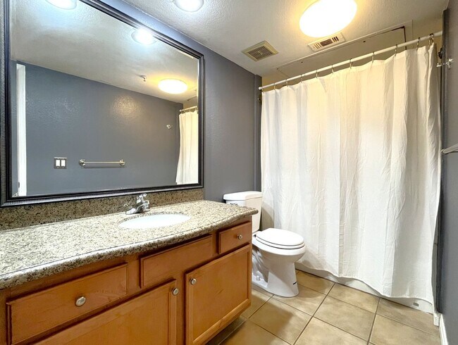 Building Photo - 1BR Condo with Private Balcony, Central A/C & Community Amenities in Corona