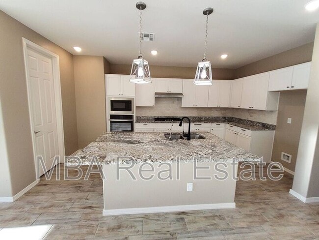 Building Photo - 704 N 152nd Dr